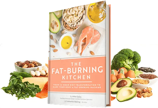 The Fat-Burning Kitchen book by Mike Geary surrounded by healthy foods including salmon, avocado, broccoli, nuts, eggs, olive oil, and leafy greens.